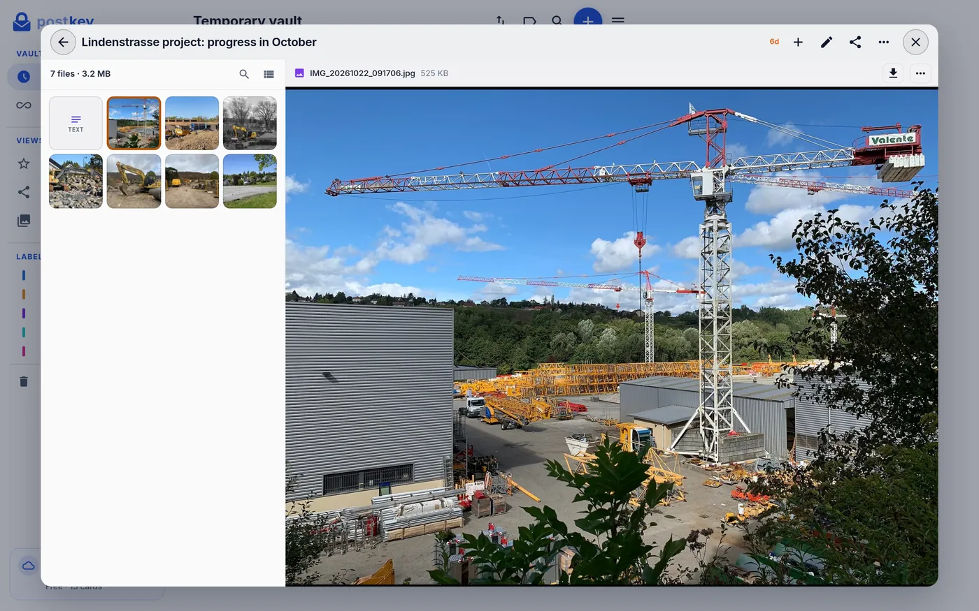 A card with construction photos